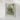 The image is a framed vintage map of a mountainous region, depicting a lush, green landscape with a river and surrounding terrain.