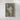 The image is a framed aerial view of a mountainous region, depicting the rugged terrain and natural landscape.