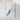 The image is a framed artwork depicting a piece of blue fabric or material, possibly a piece of clothing or textile, against a white background.