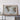 a large framed map of Greece and the Aegean Sea, displayed on a shelf or table.