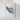 a white frame containing a large, abstract, and textured shape resembling a map or a piece of art.