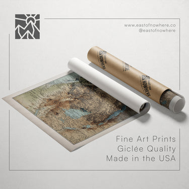 a map of the Middle East and North Africa region, along with a roll of paper and a tube of paper, all placed on a white background.