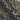 The image is a satellite view of the Glacier National Park, showing the rugged terrain and mountain ranges of the region.