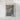 The image is a framed map of Barcelona, Spain, depicting the city's landscape and surrounding areas.