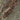 The image is a satellite view of a mountainous region, showing a rugged terrain with peaks and valleys.
